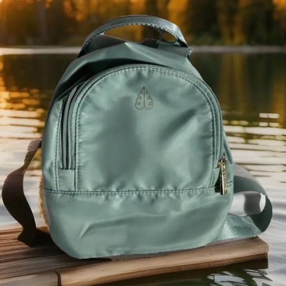 Biossance Handbags - Biossance Seafoam Mini Adjustable Backpack